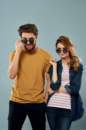 fashion couple emotions fun studio communication blue background