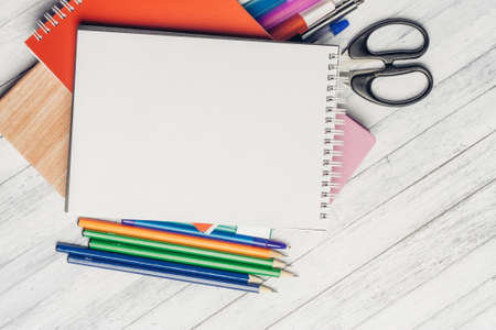 pencils for drawing notepad scissors office wooden table
