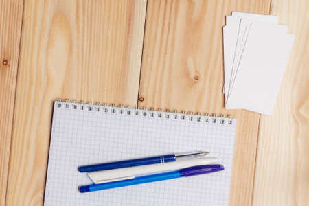 notepad pen desk wooden background office object Copy Space