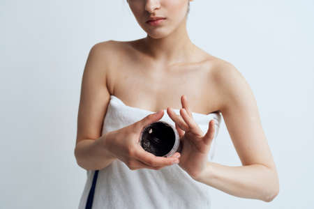 Woman towel shower skin care black cream spa treatmentsの写真素材