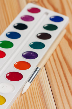 watercolor paint eat wood table drawing art close upの写真素材