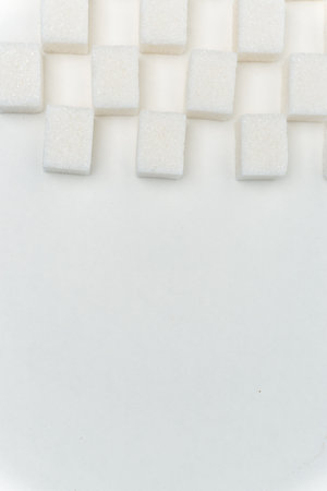 refined sugar staggered glucose ingredient calories light backgroundの写真素材