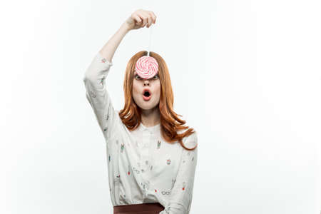 woman with lollipop in hands emotion charm sweets joy
