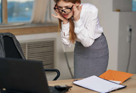 Woman secretaries working desk office laptop technology professional