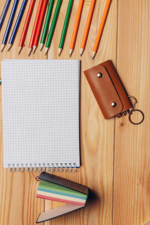 drawing pad colorful pencils wooden table school
