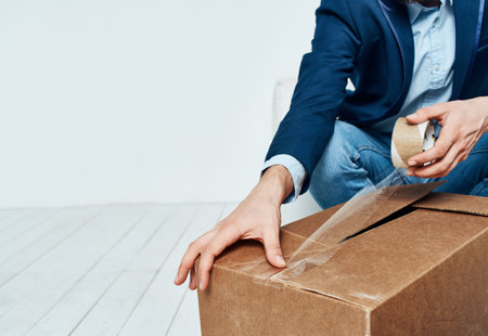 Business man pack in boxes office manager official