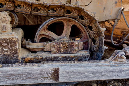yellow excavator with a steering wheel digging out the ground summer sand truck