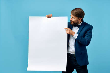 Business man in suit presentation blue background Copy Space mockupの写真素材