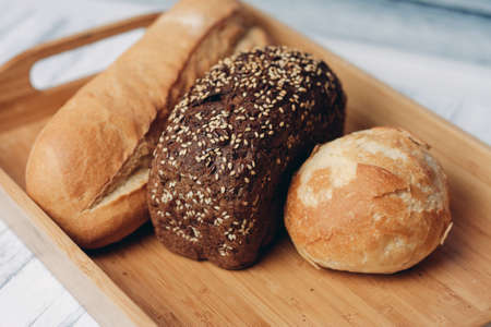 bread whole grain homemade cakes wooden tray breakfast