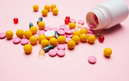 mountain multicolored pills first aid kit packaging pink health backgroundの写真素材