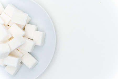 refined sugar on a plate calories sweetsの写真素材