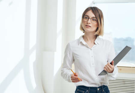 Woman business documents interior window room financeの写真素材