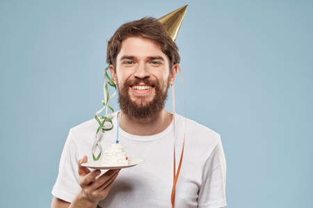 Bearded man with a cap on his head holiday gift cake