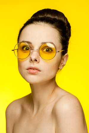 sexy brunette naked shoulders fashion glasses cropped viewの写真素材