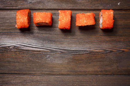 rolls red ginger food delivery japanese restaurant gourmet wooden table