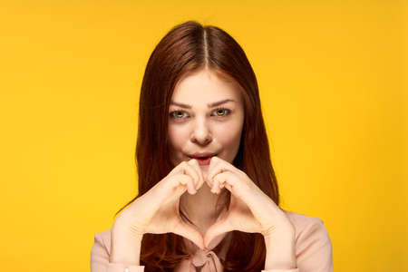 beautiful woman glamor cosmetics facial studio yellow background