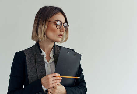 Business woman in classic suit documents model director of the firm