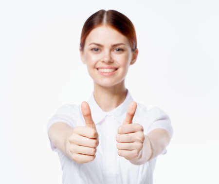 pretty woman gesturing with hands emotion white shirt studio isolated background
