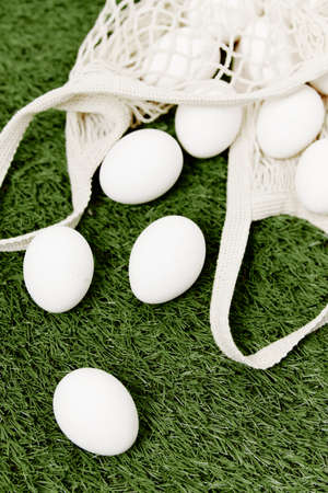 scattered eggs on a green lawn Easter day holiday close-up