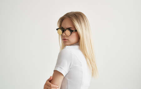 pretty woman glasses in the form of cryptocurrency Bitcoin Gold internet economyの写真素材