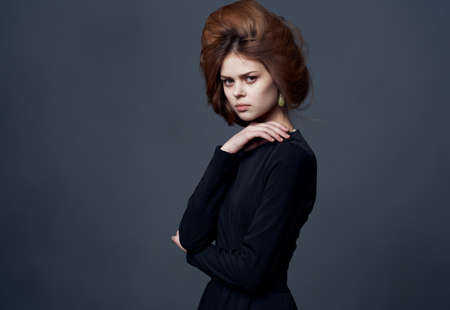 Elegant woman hairstyle luxury black dress eveningの写真素材