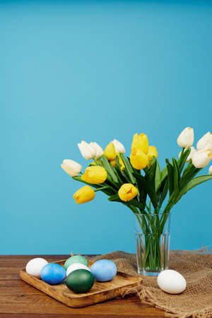 spring flowers easter eggs decoration tradition blue background