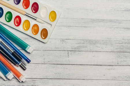 paint colored pencils handles wooden background textureの写真素材