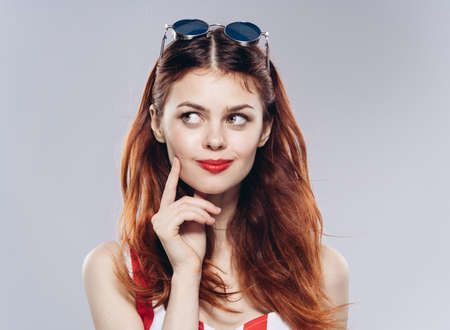 pretty woman in red red shirt glamor bright makeup fashionの写真素材