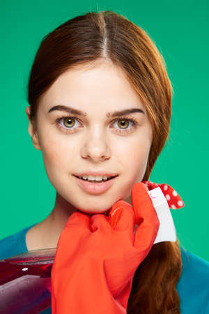 cleaning lady with detergent rubber gloves work service professionalの写真素材