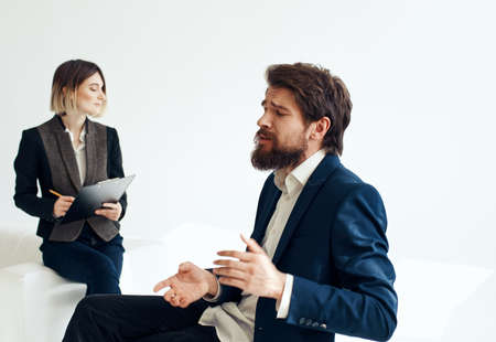 Women and men in suits In the bright room of interviews hiring