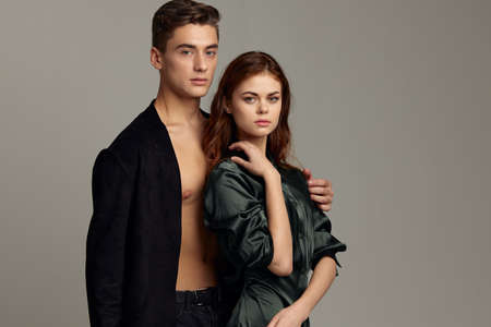 cute young couple attractive look romance hug studioの写真素材