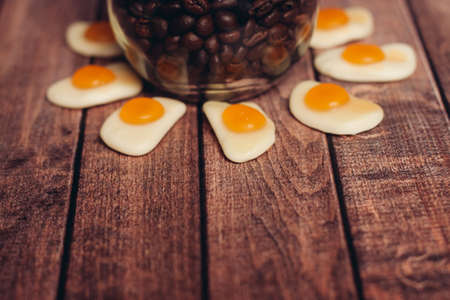 sweets and cookies for tea on a wooden table breakfast dessertの写真素材