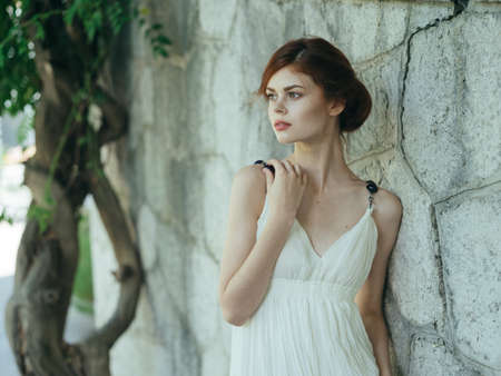 Woman in white dress decoration nature traditional clothes summerの写真素材