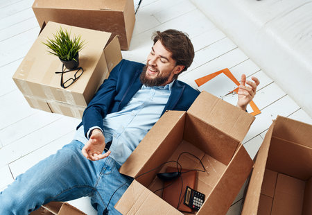 Business man with boxes office moving office officialの写真素材