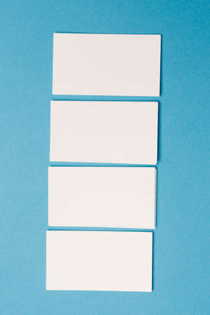 blank business cards on blue background mockup Copy space