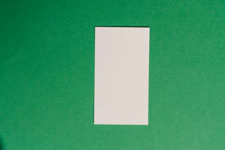 business cards on a green background office desk financeの写真素材