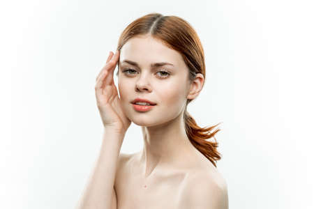 attractive woman naked shoulders cosmetics feminine lookの写真素材