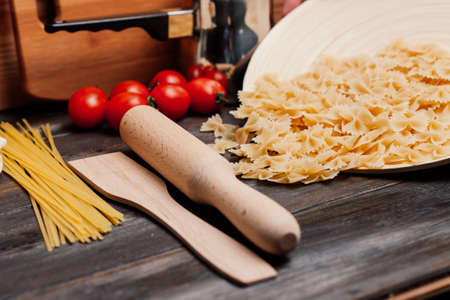 italian pasta cuisine cooking ingredients cherry tomatoes lunchの写真素材