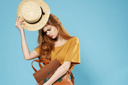 Pretty woman elegant style fashion clothes Studio cosmetics blue backgroundの写真素材