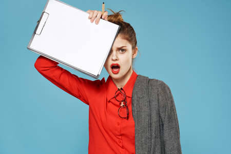 Business woman in suit documents executive studioの写真素材