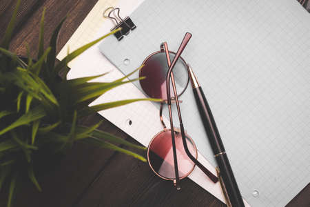 stationery notepads glasses paper with clip coffee cup flowerの写真素材