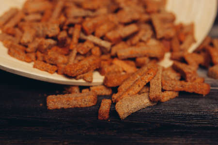 crackers for beer snacks crunch on wooden tableの写真素材