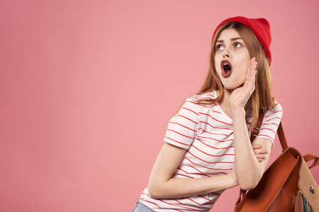 cheerful emotional woman fashion studio fun pink backgroundの写真素材