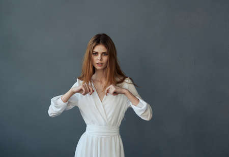 pretty woman in white dress elegant style dance modelの写真素材