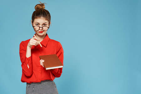 elegant woman red shirt secretary official office notepadの写真素材