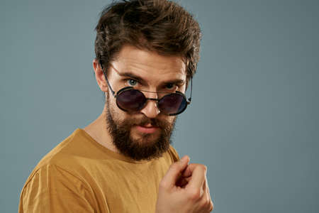 handsome bearded man sunglasses fashion emotions serious lookの写真素材