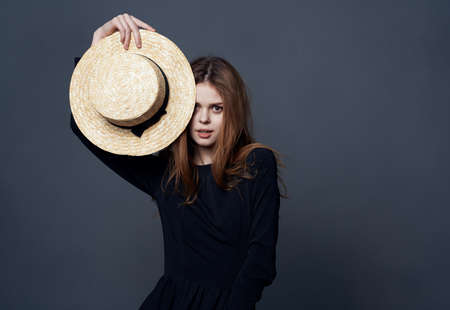 Pretty woman in hat fashion glamor and luxury dark background