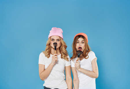 Two girlfriends weekend cosmetics lifestyle fun communication lifestyleの写真素材