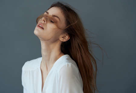 beautiful woman glamor white dress attractive look close-upの写真素材