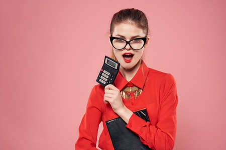 Business woman in formal suit official elegant stylish pink backgroundの写真素材